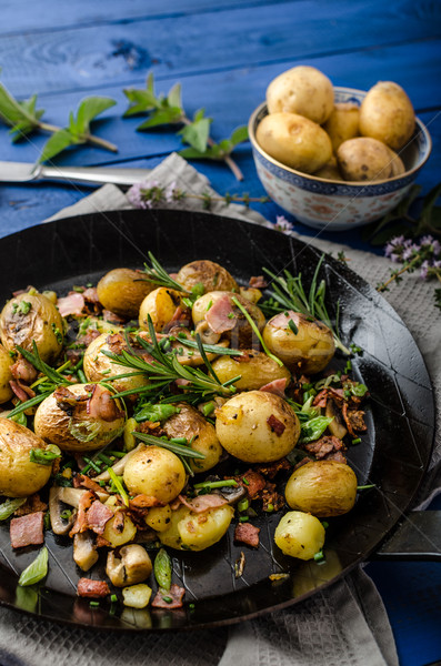 Cowboy potatoes with bacon and herbs Stock photo © Peteer