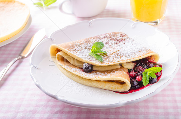 Stock photo: Homemade crepes with berries