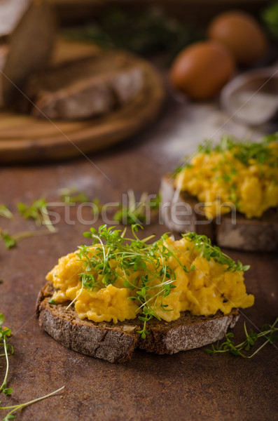Scrambled eggs, wholegrain bread Stock photo © Peteer