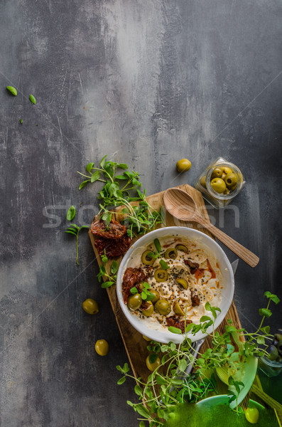 Fresh cheese with olives, dried tomatoes Stock photo © Peteer