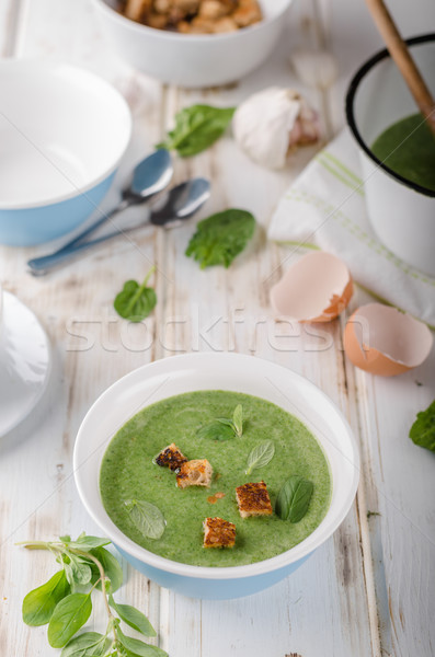 Spinach soup with poached egg Stock photo © Peteer