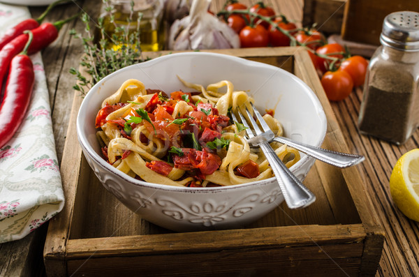 Pasta with cherry tomatoes pesto Stock photo © Peteer