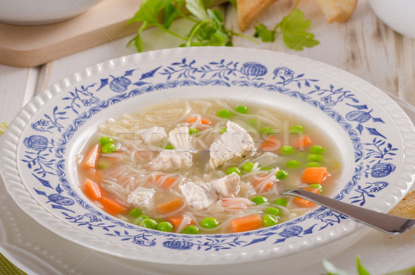 Spring chicken soup noodles, vegetable and toast Stock photo © Peteer