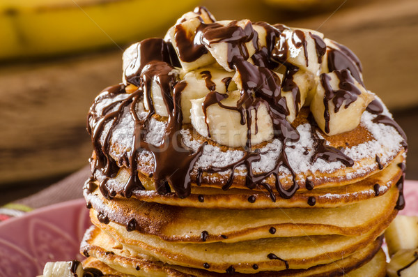 American pancakes with banana, chocolate Stock photo © Peteer