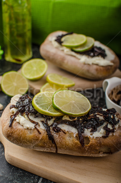 Helthy bread with cheese and caramelized onions Stock photo © Peteer