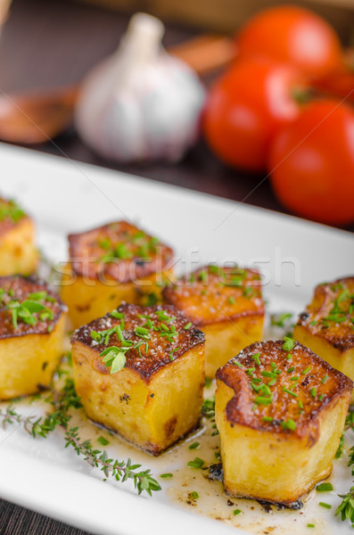 Potato fondant with garlic and herbs Stock photo © Peteer
