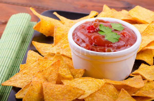 Tortilla chips with spicy tomato salsa Stock photo © Peteer