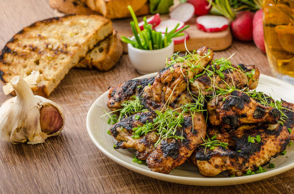 Grilled teriyaki chicken wings Stock photo © Peteer