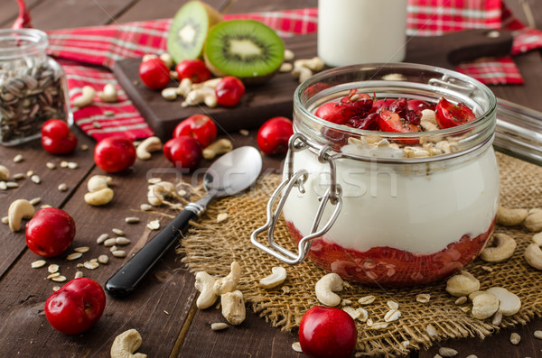Stock photo: Domestic cherry yogurt with wonder chia seeds and granula