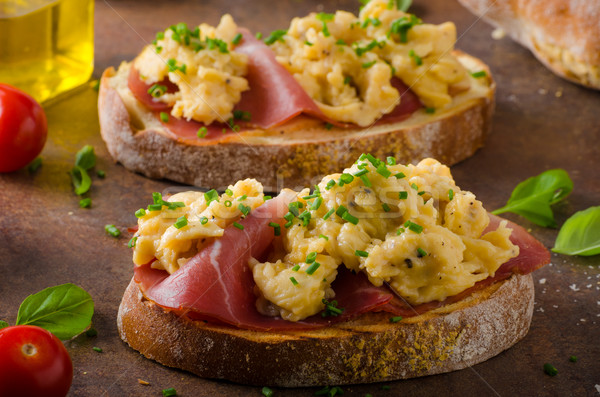 Delicious toasted bread with scrambled eggs Stock photo © Peteer