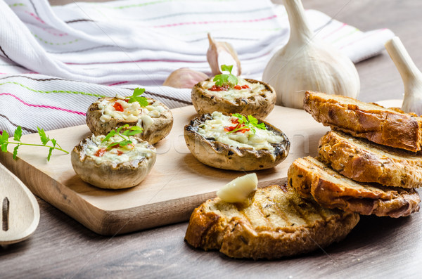 Grilled mushrooms stuffed cheese and chilli Stock photo © Peteer