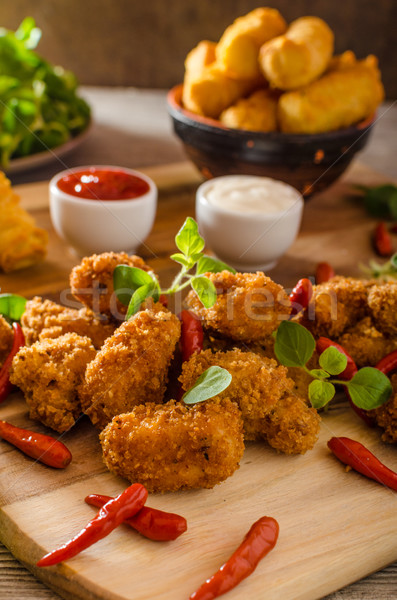 Kip popcorn eigengemaakt aardappel hete saus Stockfoto © Peteer