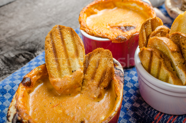 Tomato and cheese dip baked with crispy garlic toast Stock photo © Peteer