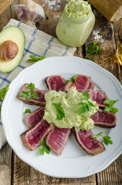 Beef steak with avocado dip and herbs Stock photo © Peteer