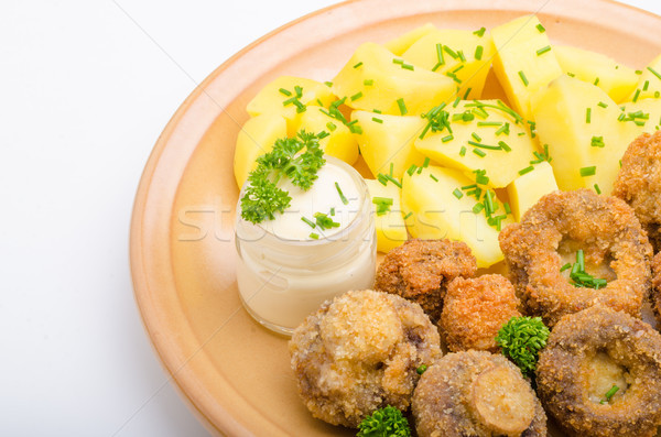 Stock photo: Breaded mushrooms fried with mayo