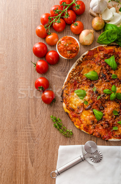 Cheese pizza with chilli and basil Stock photo © Peteer