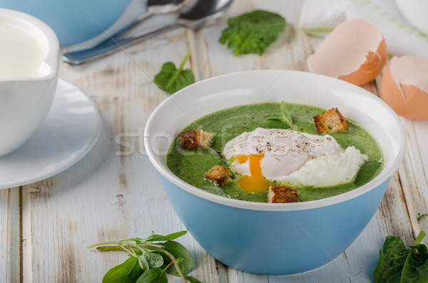 Spinach soup with poached egg Stock photo © Peteer