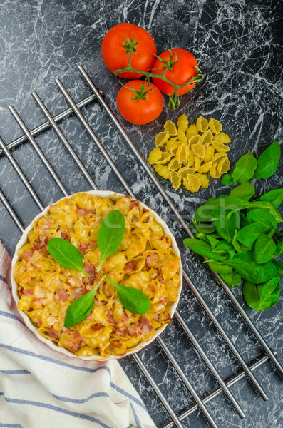 Baked homemade pasta with leeks, bacon and cream Stock photo © Peteer