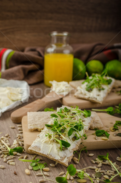 Healthy breakfast, Crispbread with organic cream cheese Stock photo © Peteer