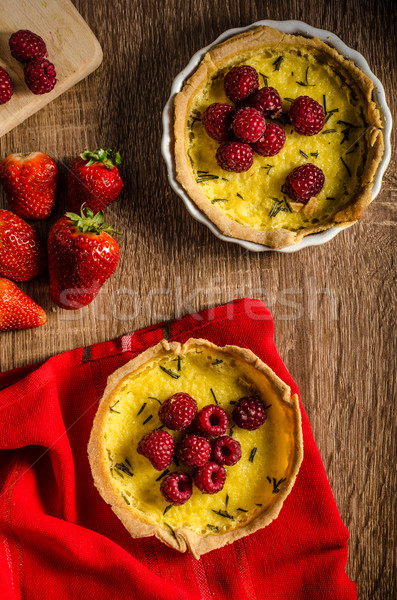 Lemon tart with rosemary and berries Stock photo © Peteer