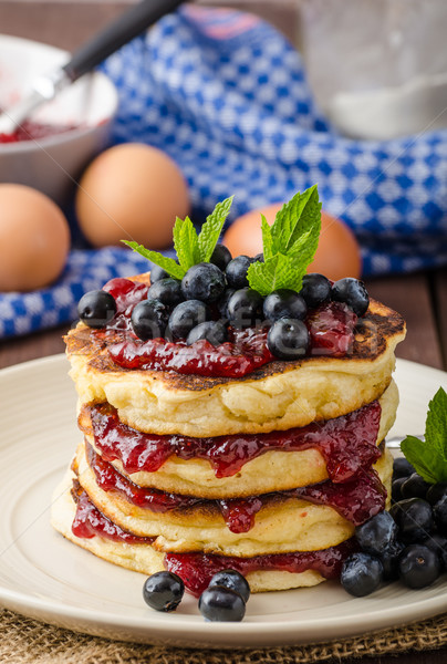 Glutten-free pancakes with jam and blueberries Stock photo © Peteer