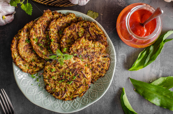 Potato pancakes fried with garlic Stock photo © Peteer