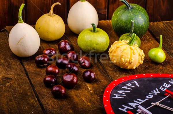Halloween still life of pumpkins, inscription, shadows Stock photo © Peteer