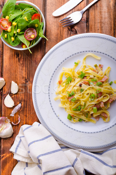 Italian pasta with spring onion and bacon Stock photo © Peteer