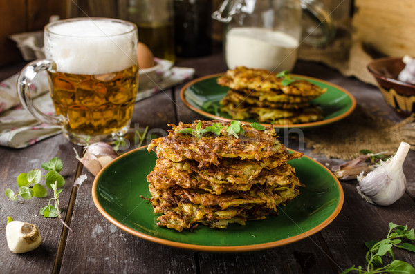 Potato pancakes with garlic and beer Stock photo © Peteer