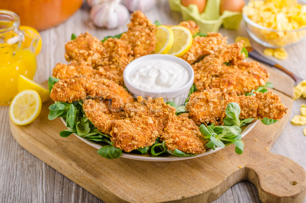 Chicken strips with delish garlic dip Stock photo © Peteer