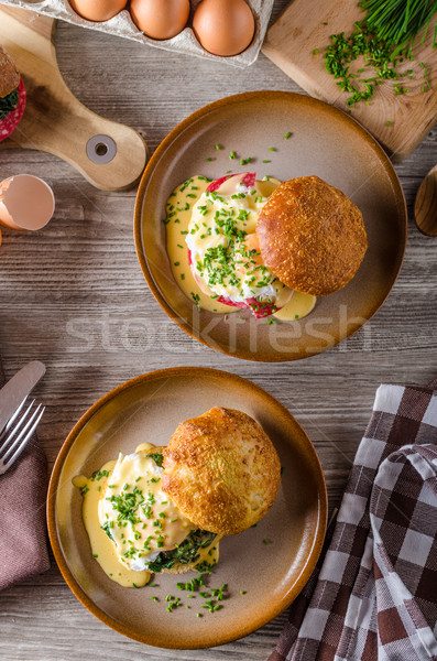 Egg benedict with hollandaise sauce Stock photo © Peteer