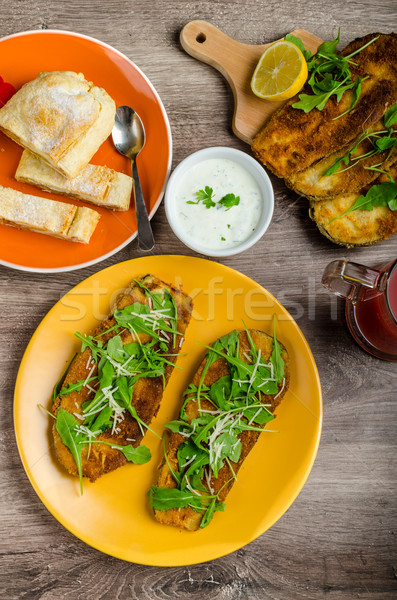 Breaded eggplant parmesan and arugula Stock photo © Peteer