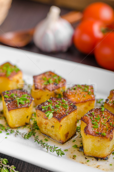 Potato fondant with garlic and herbs Stock photo © Peteer