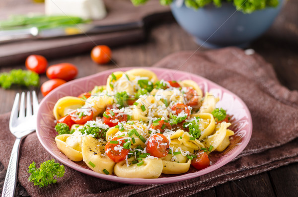 Tortellini ervas tomates fresco queijo comida Foto stock © Peteer