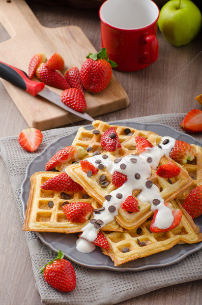 Homemade waffles with maple syrup and strawberries Stock photo © Peteer