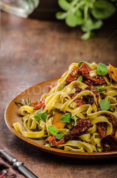 Pasta with sun dried tomatoes Stock photo © Peteer