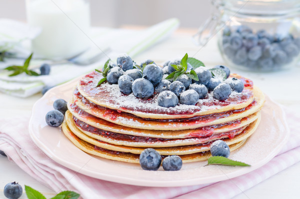 Vintage pancakes outside garden with blueberries Stock photo © Peteer