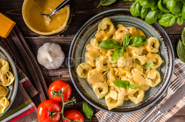 Tortellini with cheese sauce Stock photo © Peteer