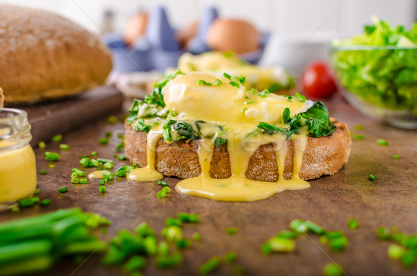 Egg benedict with spinach Stock photo © Peteer