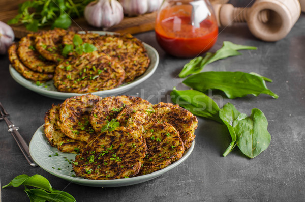 Potato pancakes fried with garlic Stock photo © Peteer