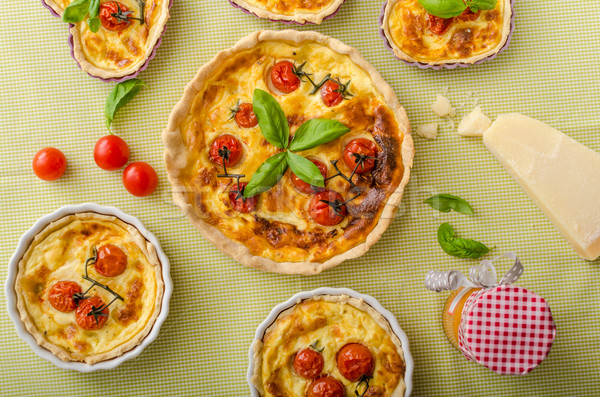 Quiche with cheese and cherry tomatoes Stock photo © Peteer