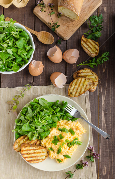 Huevos revueltos ensalada frijoles baguette panini Foto stock © Peteer