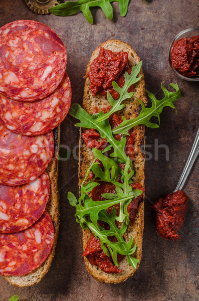 Rústico baguette hierbas chorizo salsa de tomate caliente Foto stock © Peteer