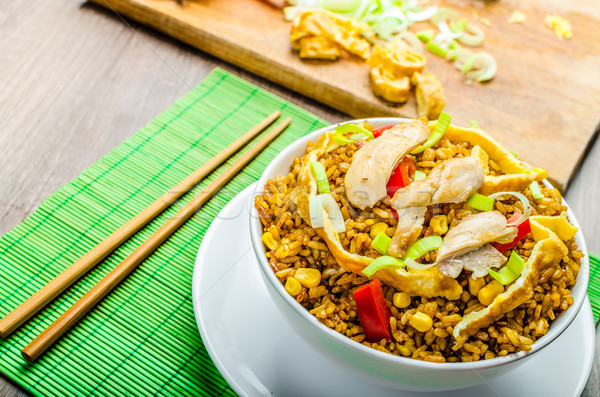 Chicken curry rice with crispy chinese omellete Stock photo © Peteer