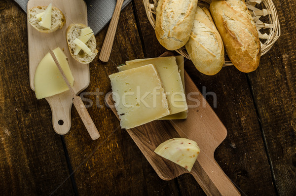 Delicious ripe cheese with crispy baguette and wine Stock photo © Peteer