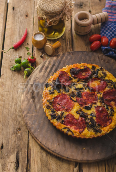 Stock photo: Delicious quiche with chorizo, nuts and sharp cheese