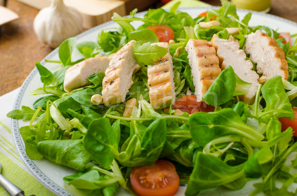 Arugula and lamb's lettuce with grilled chiken Stock photo © Peteer