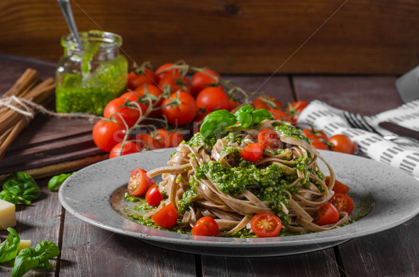 Pasta with basil pesto and parmesan Stock photo © Peteer