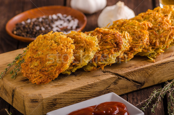 Delish potato pancakes with ketchup Stock photo © Peteer