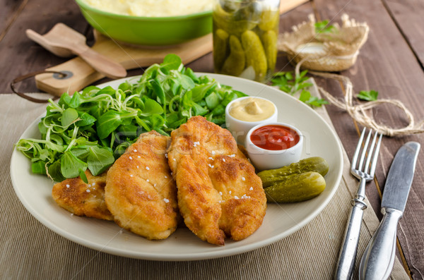 Schnitzel with mashed potatoes and salad Stock photo © Peteer